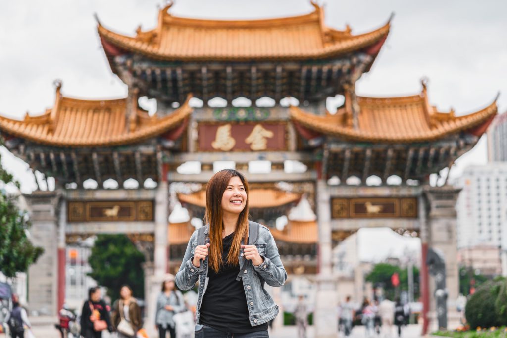 Asian traveler woman looking and sightseeing when travelling ove